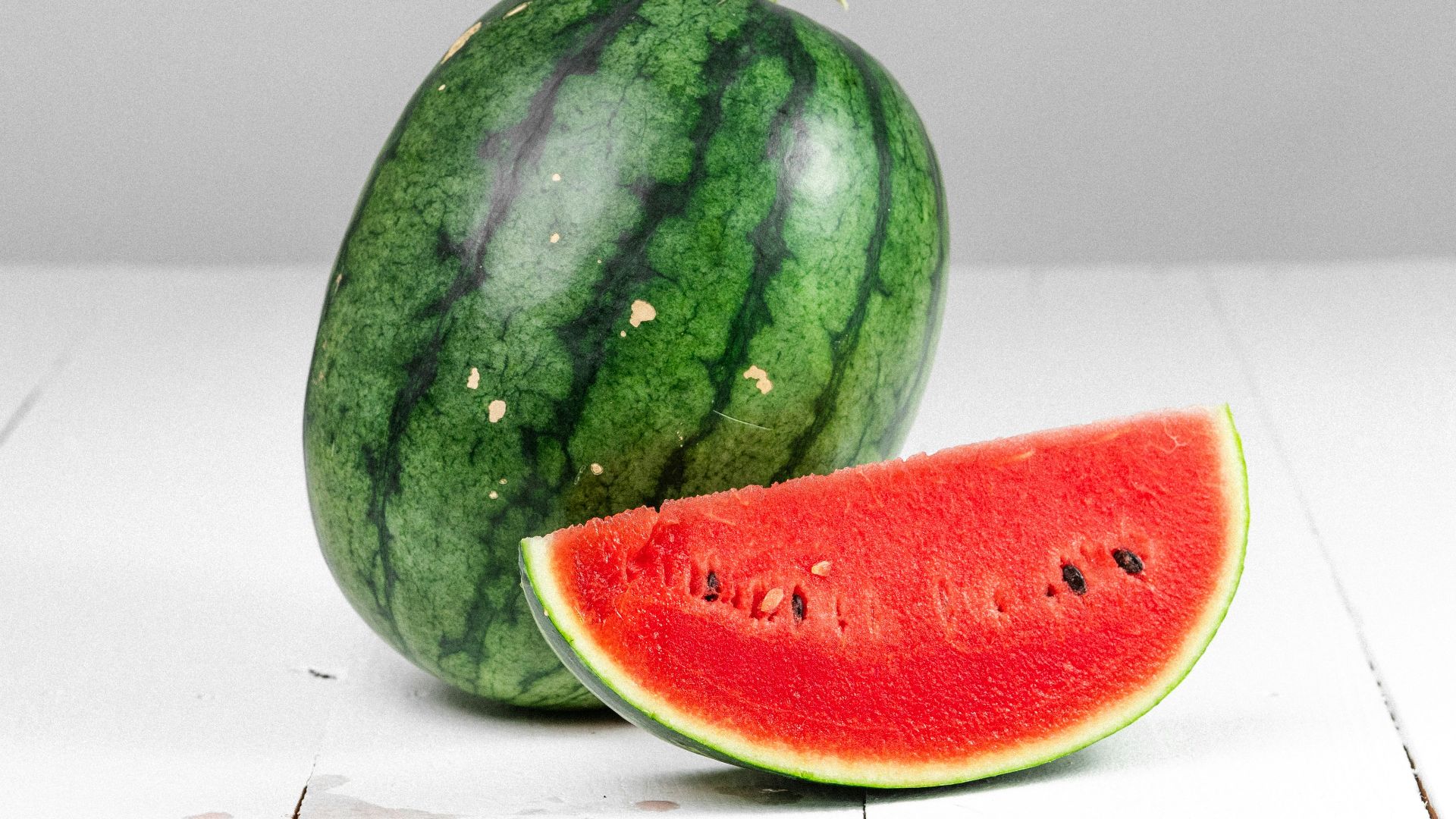 watermelon fruit on white table