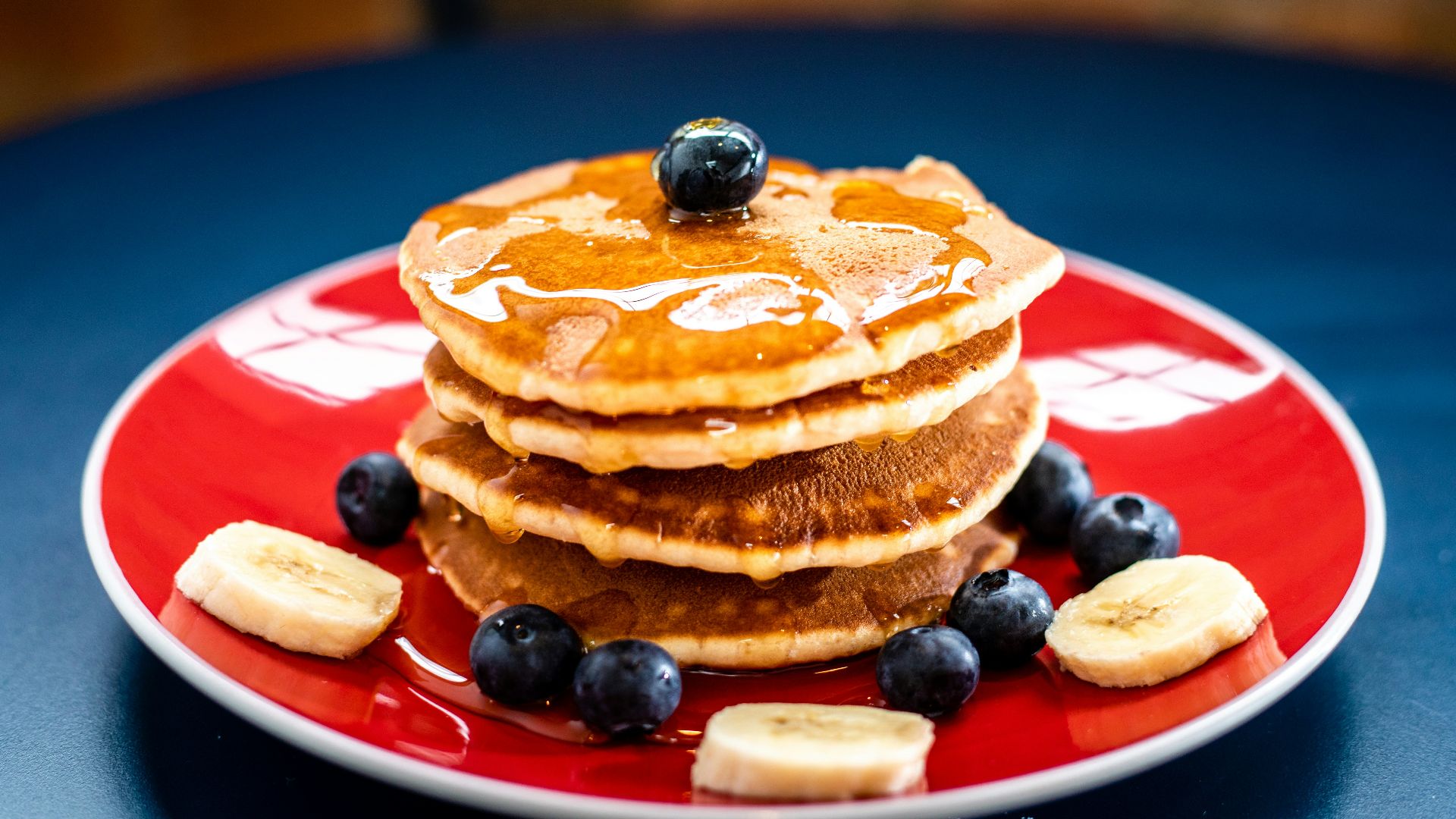 baked pancake with blueberry and slice of banan