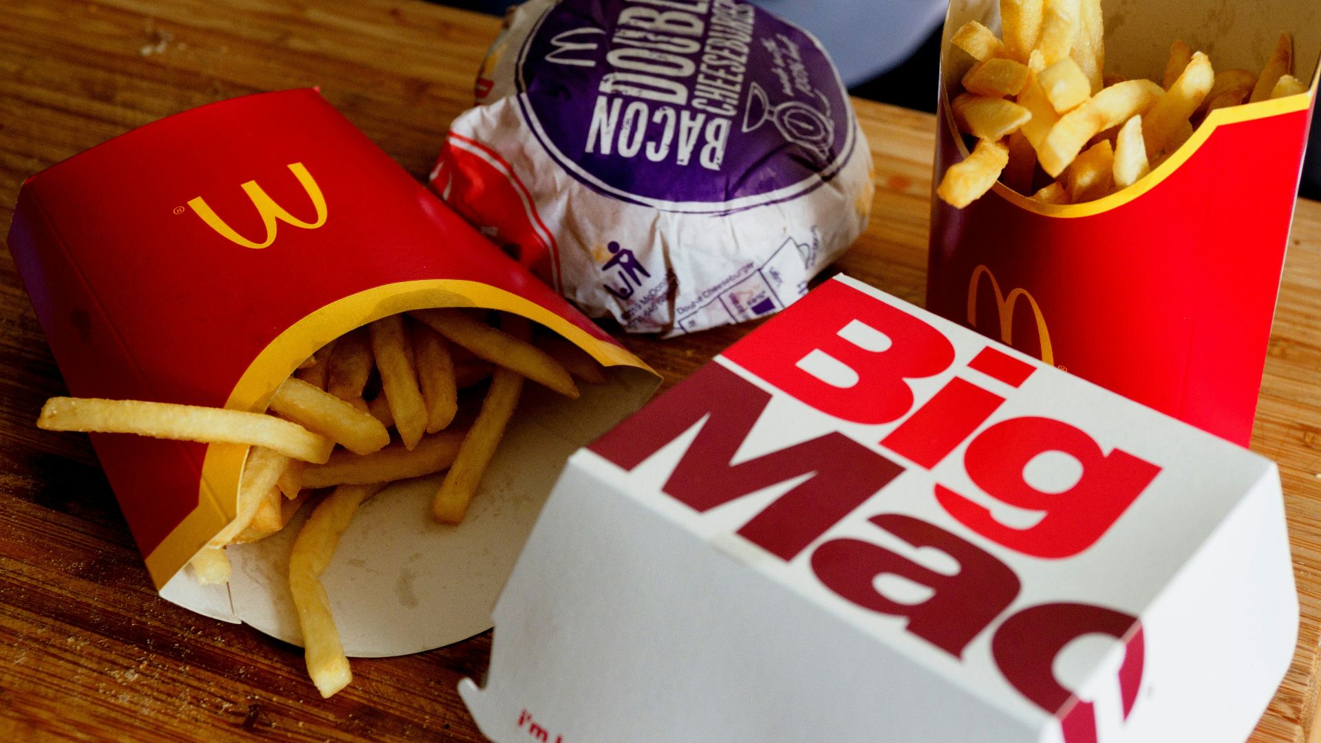 a sandwich sitting on top of a wooden table