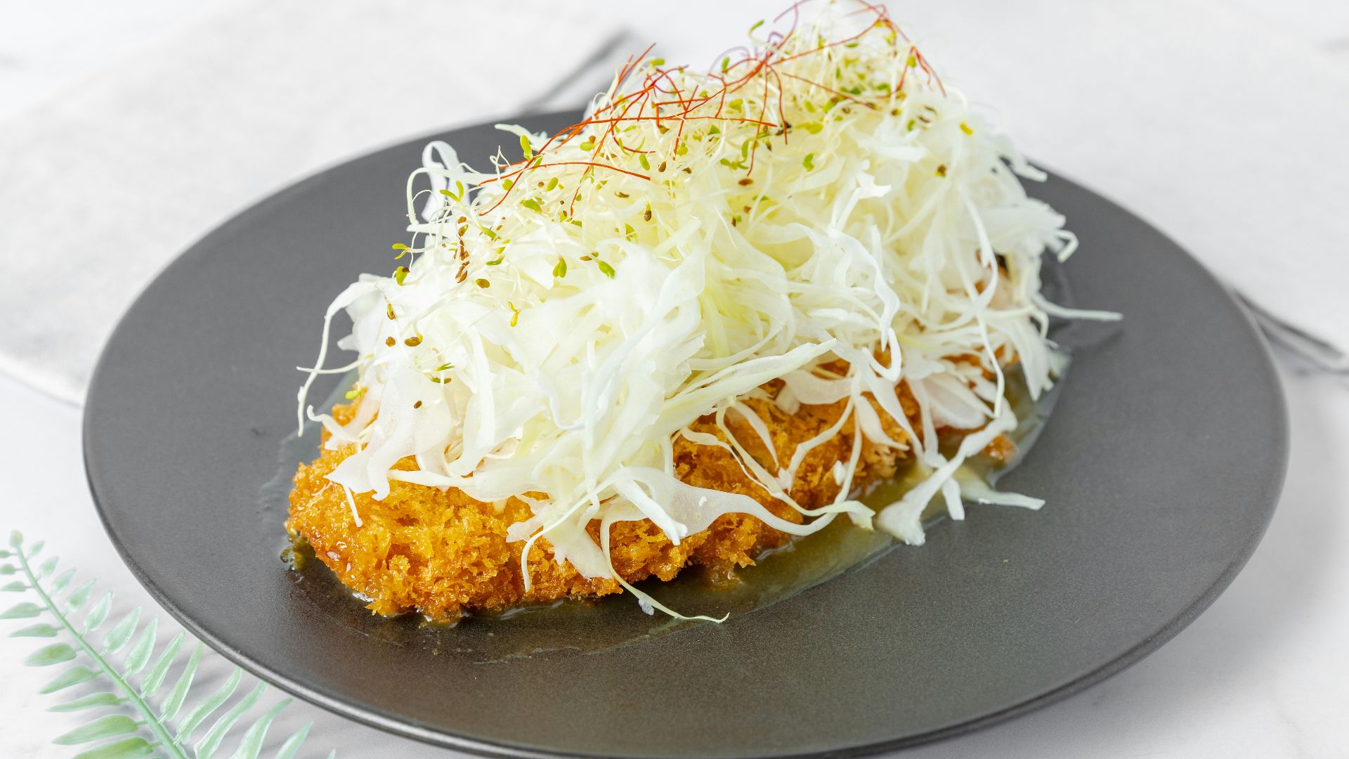 A piece of food that is on a plate