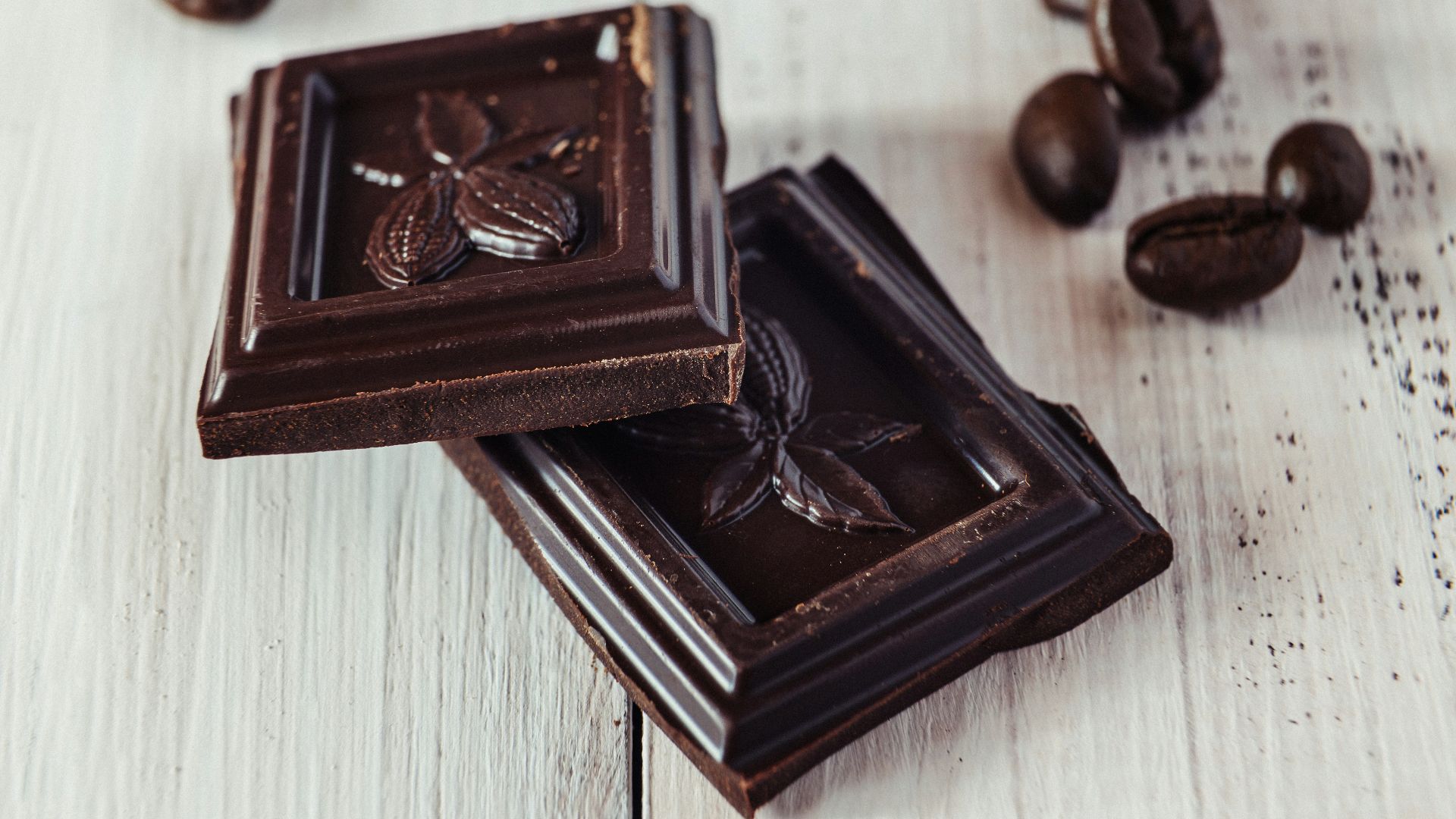 a couple of pieces of chocolate sitting on top of a table