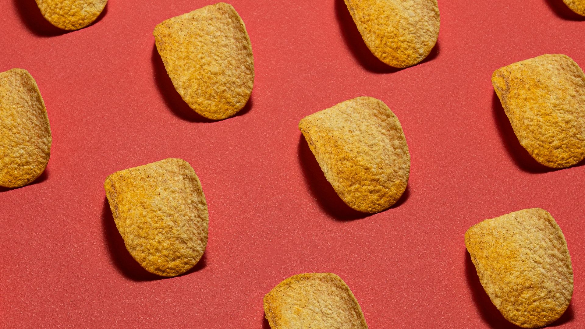 a close up of some food on a red surface