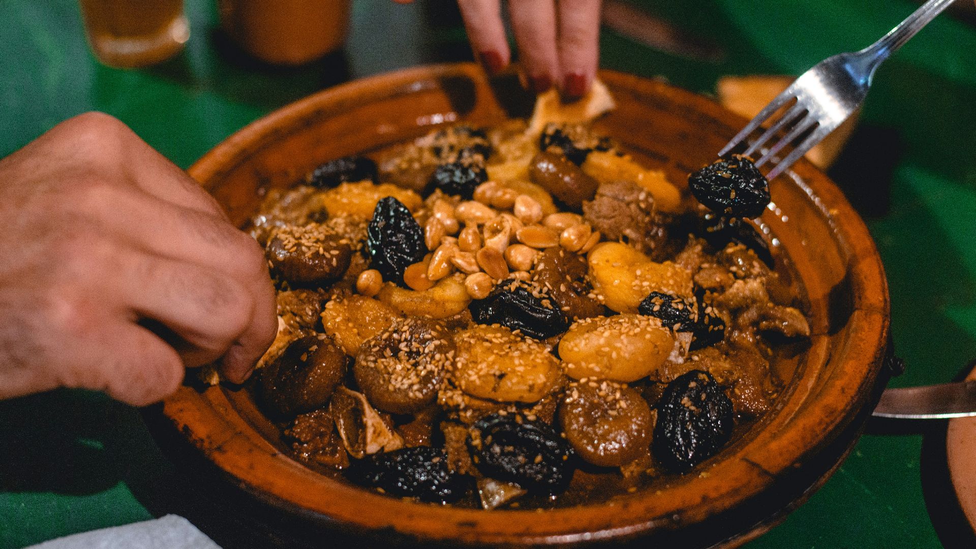 a person eating a bowl of food