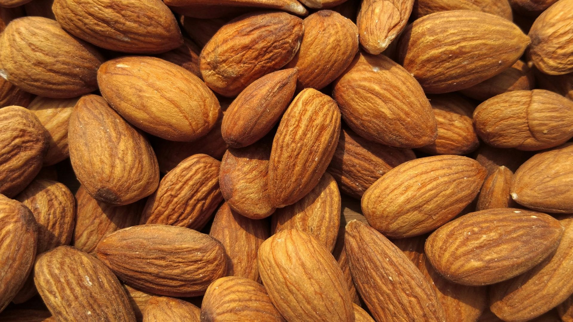 brown and yellow almond nuts