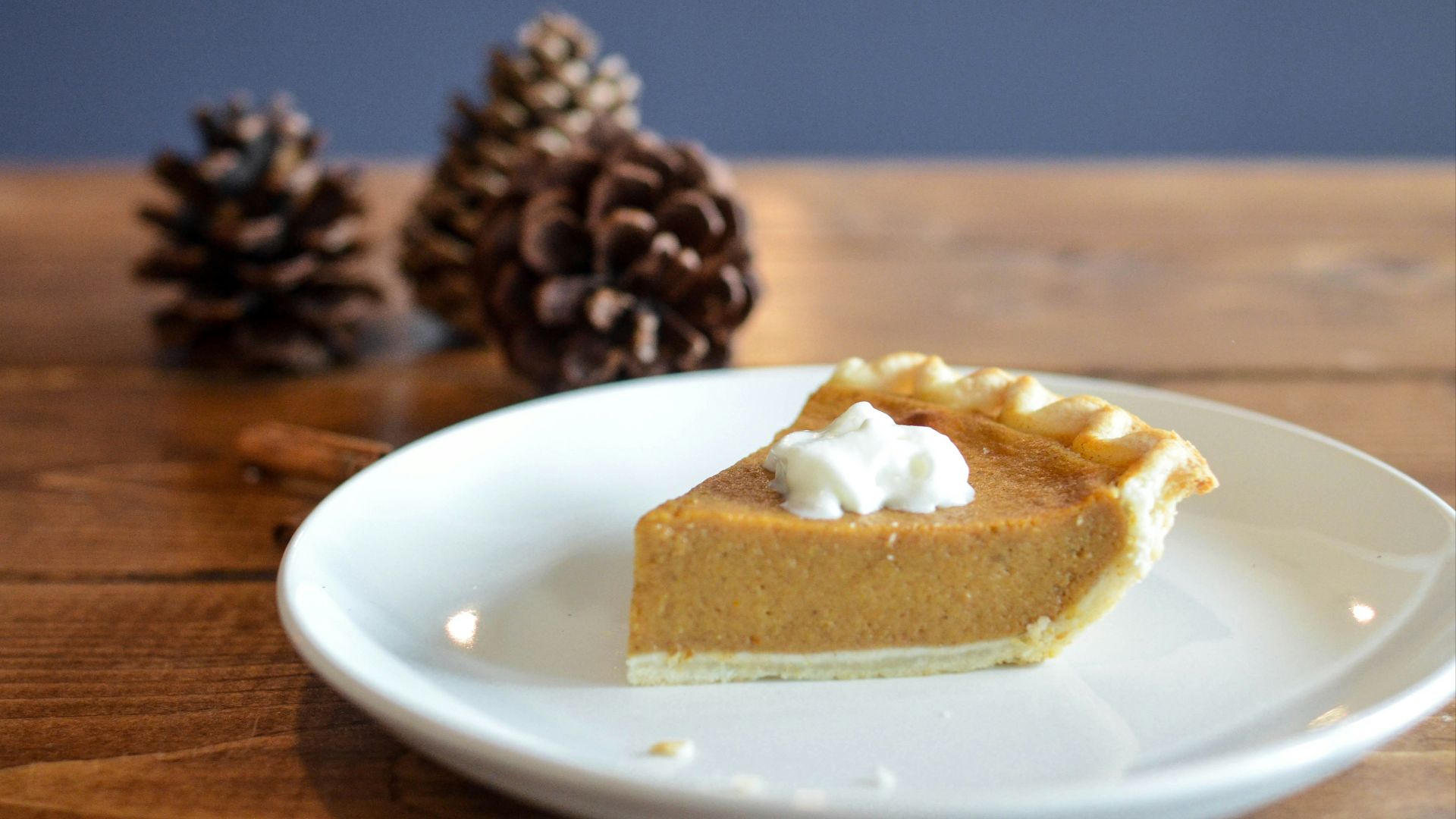 closeup photo of sliced pie on white ceramic saucer