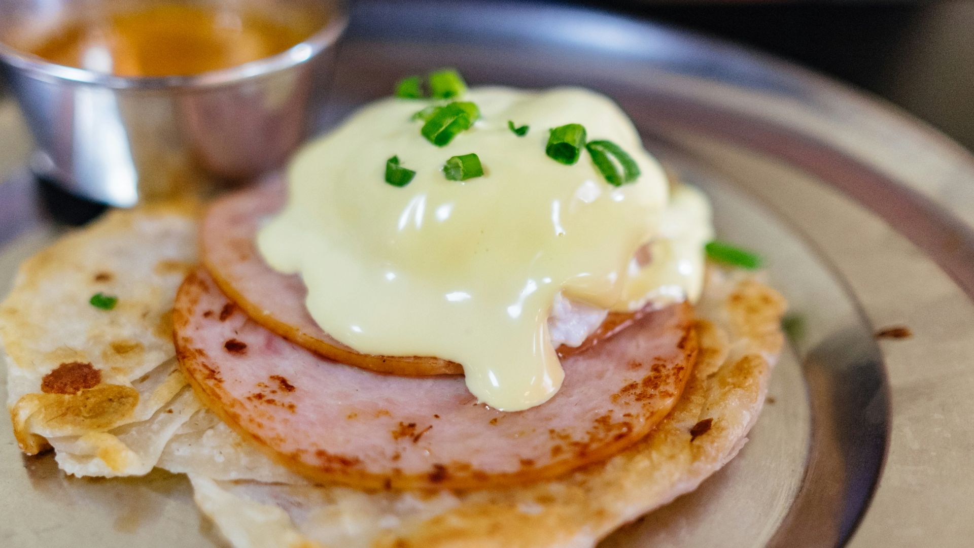 melted cheese on top of cooked ham