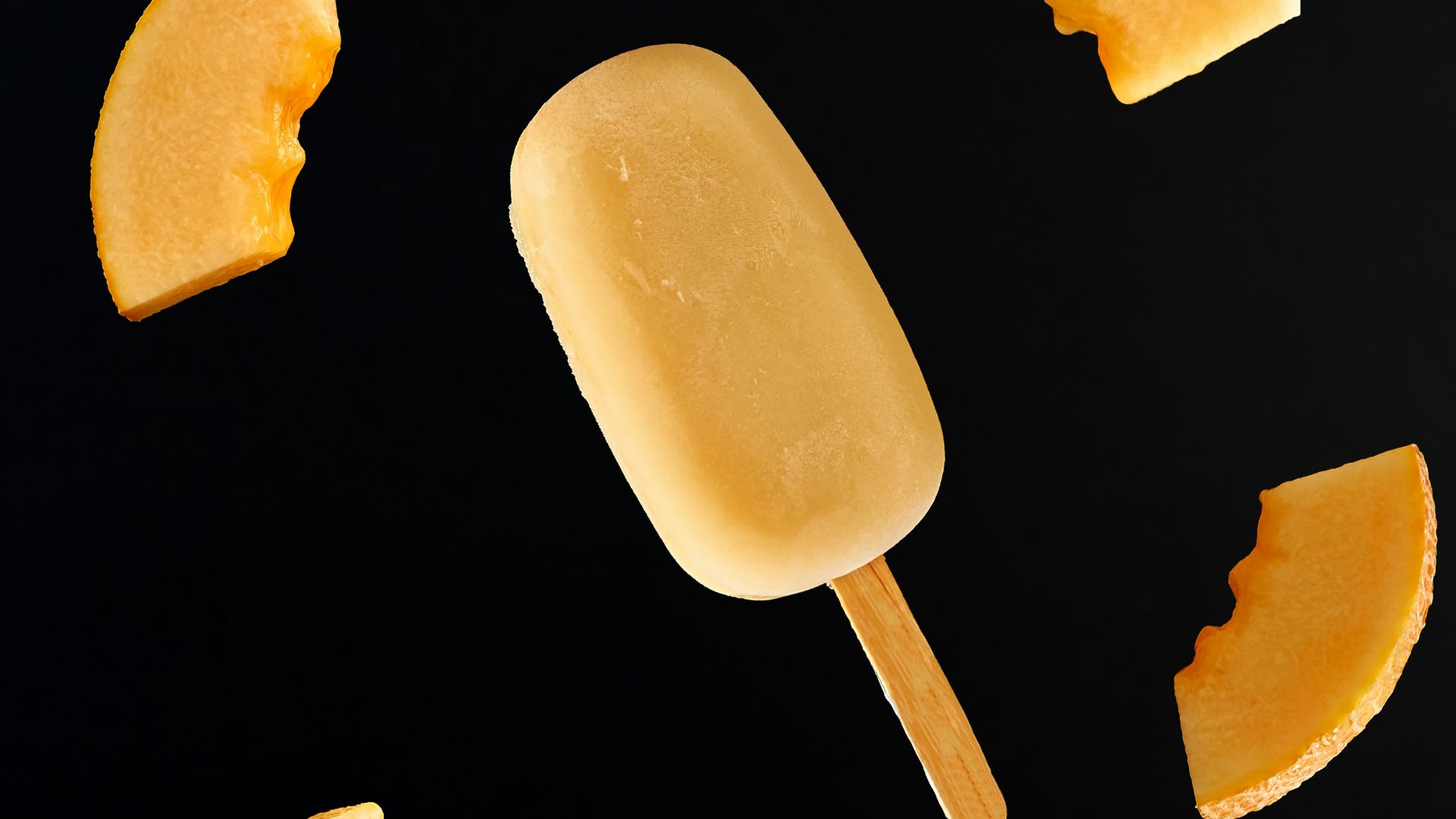 yellow ice pop on black textile