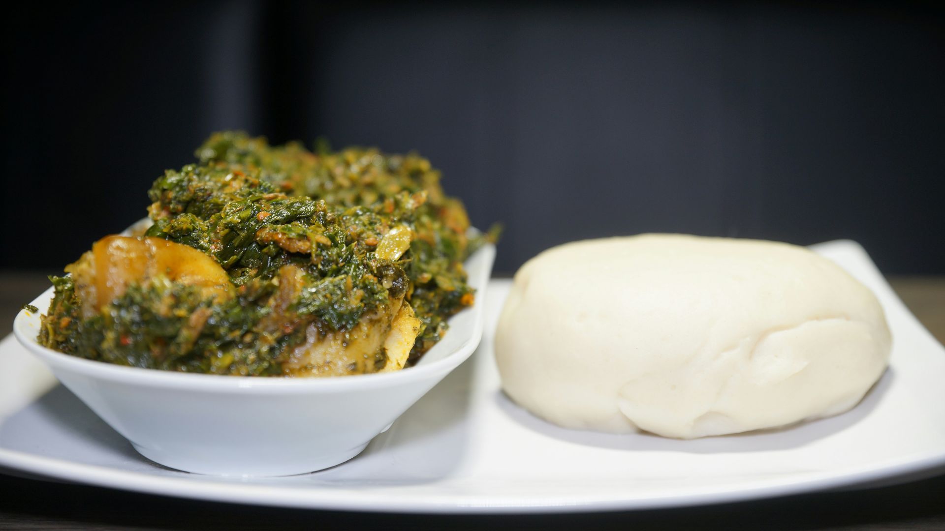 white ceramic bowl with green vegetable dish