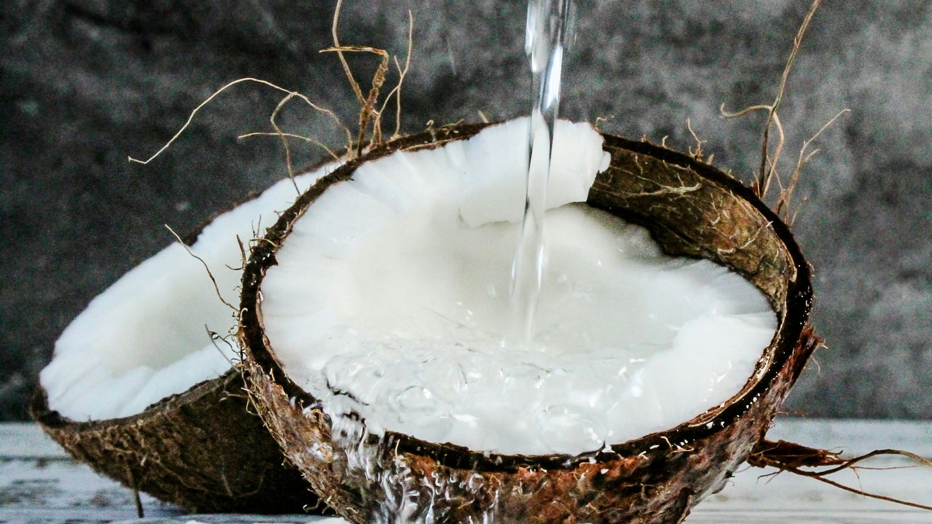 brown and white cake with white candle