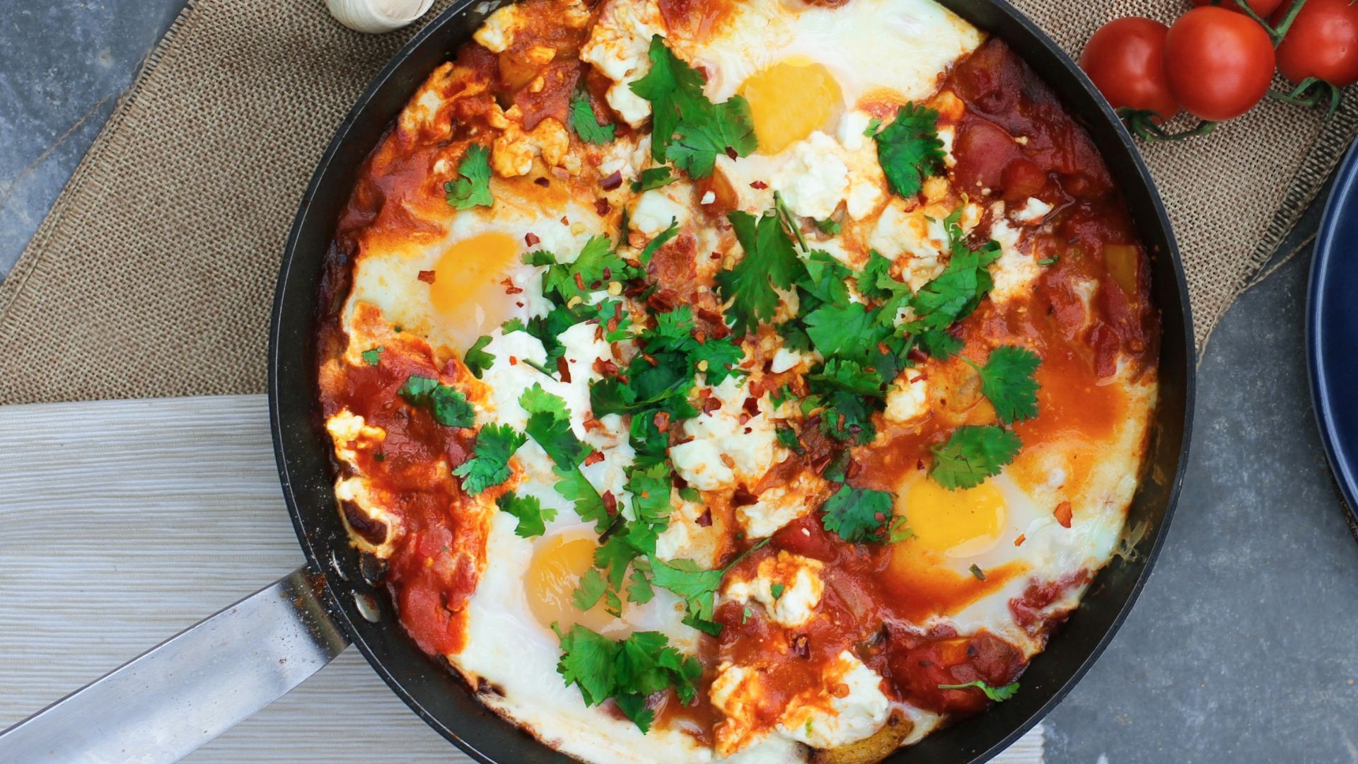 steam pasta beside tomatoes and plate