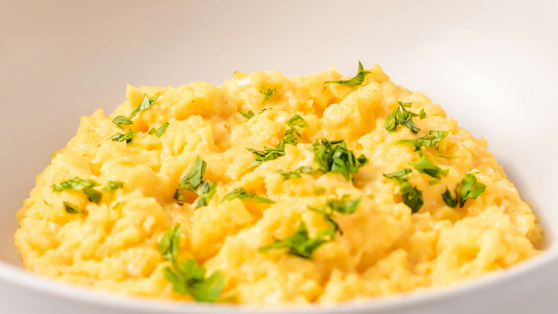 a close up of a bowl of food on a table