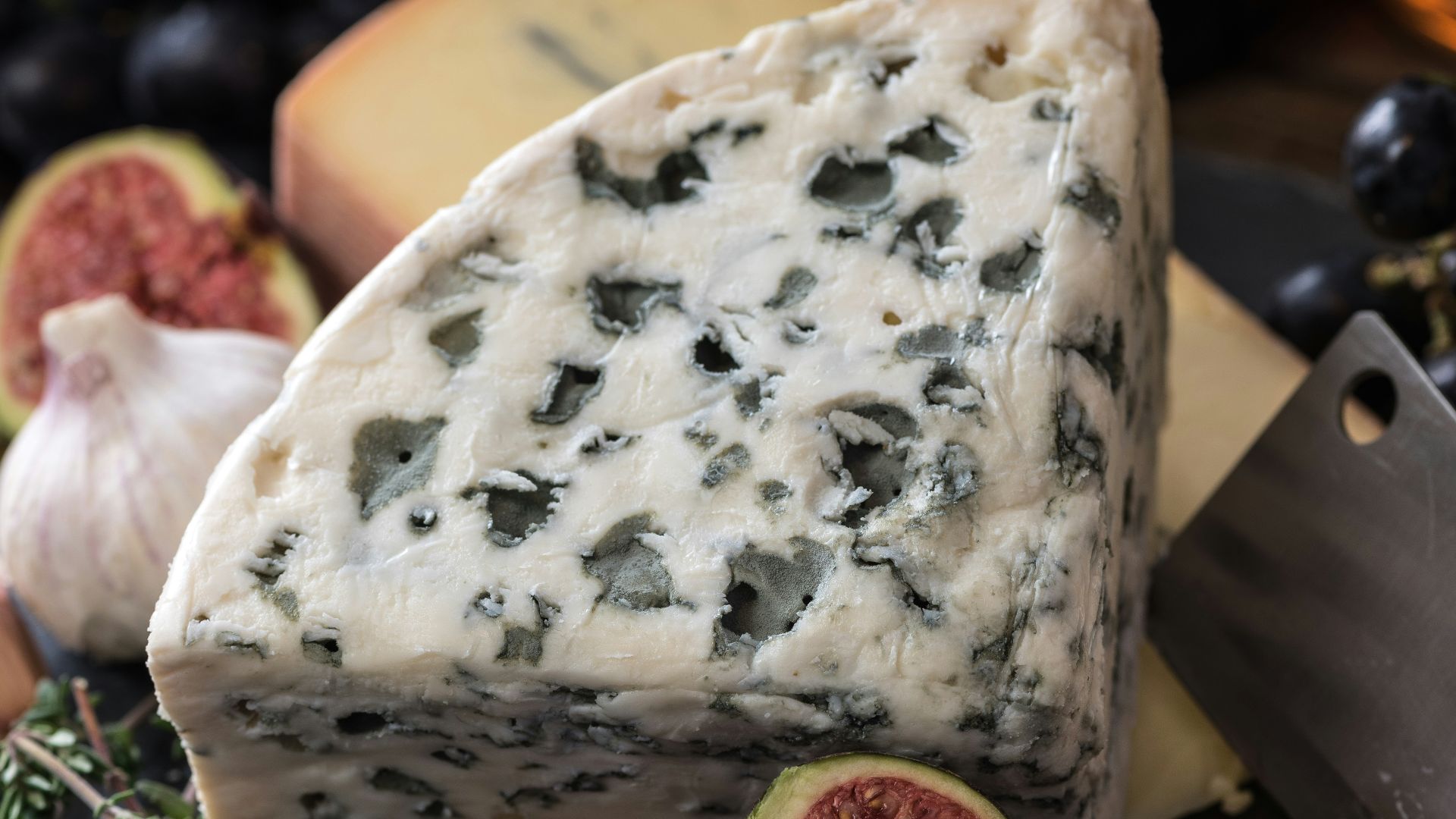 bolognese cheese beside herbs