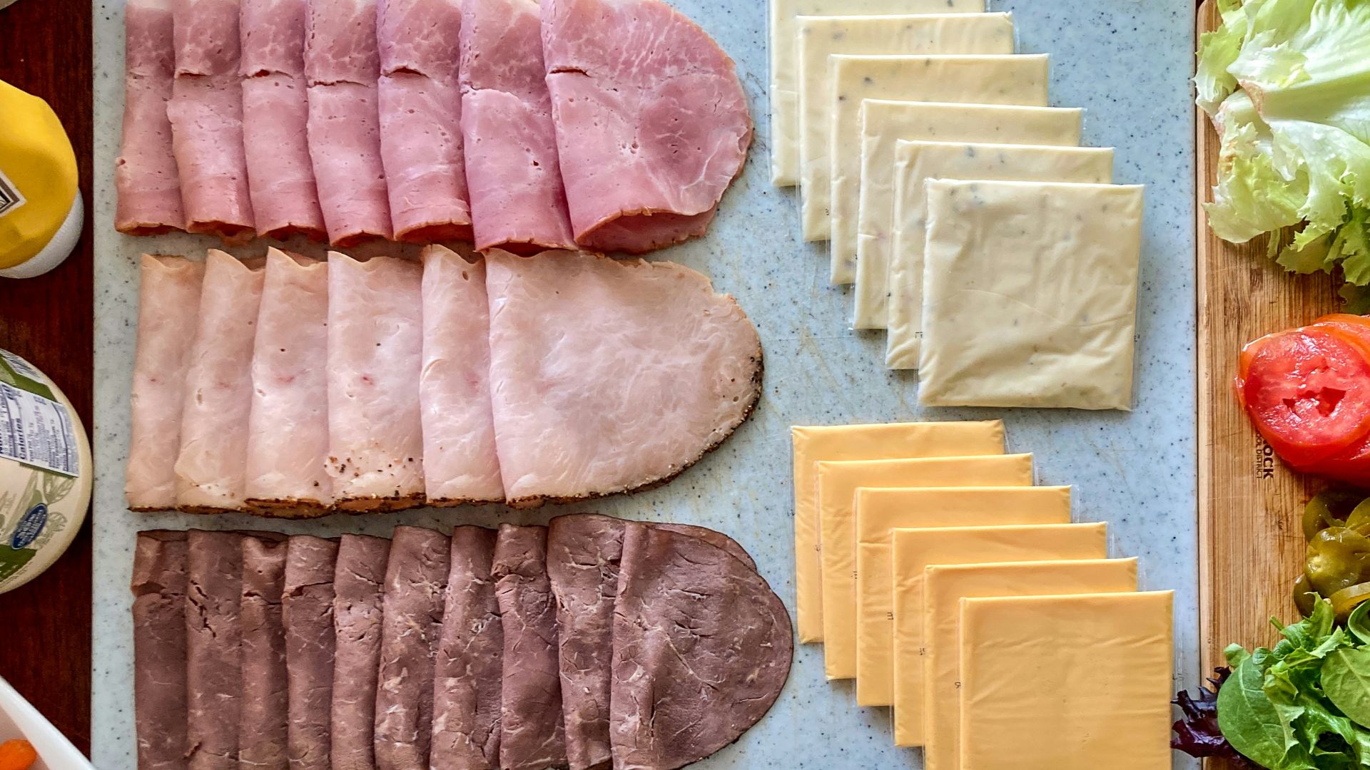 a variety of food is laid out on a table