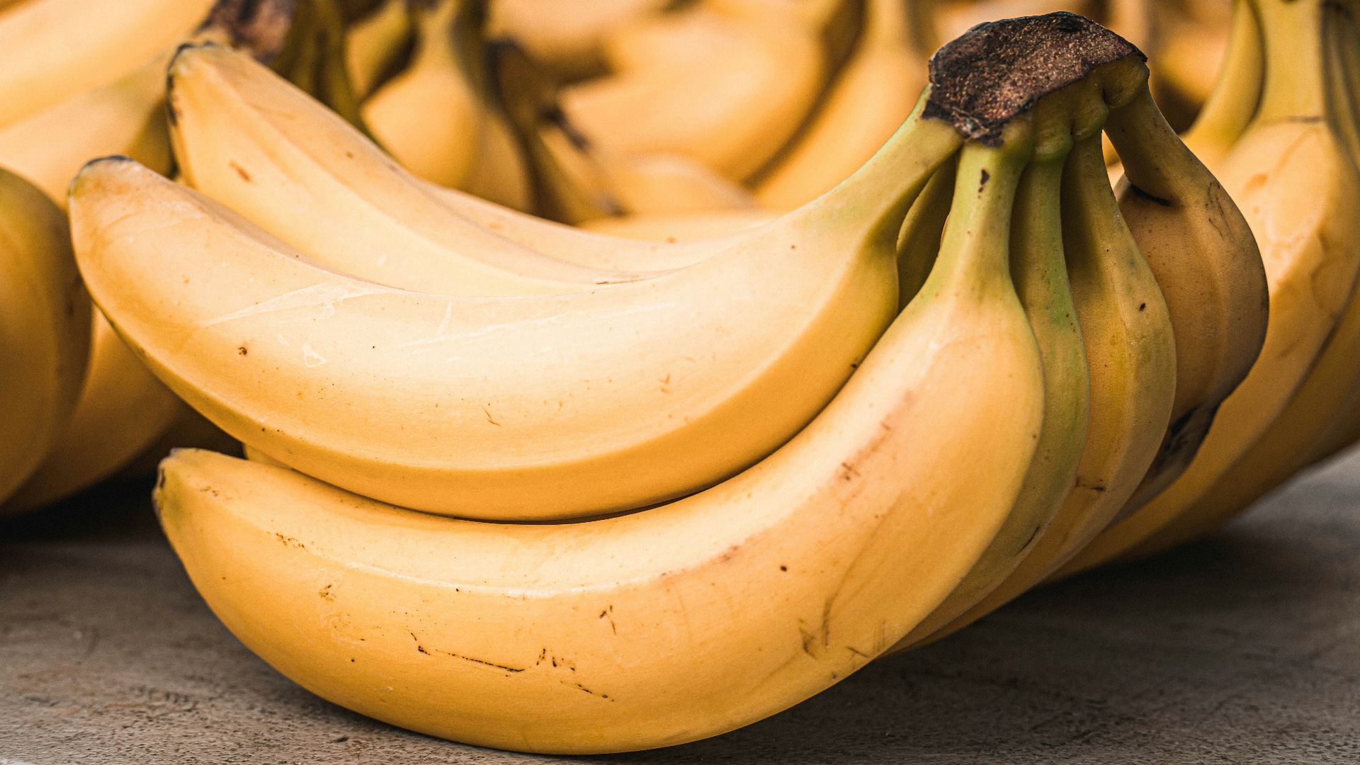 a bunch of bananas sitting on top of a table