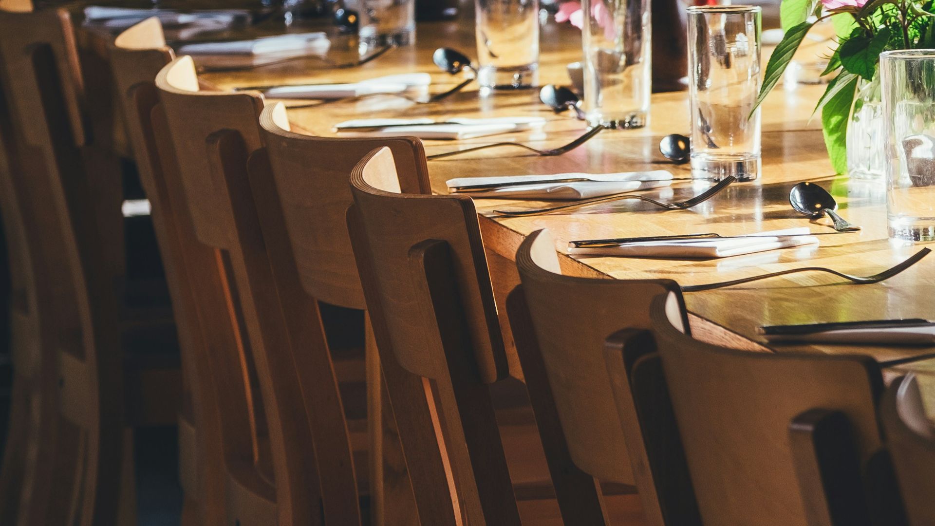 dining table with drinking high glass and fork
