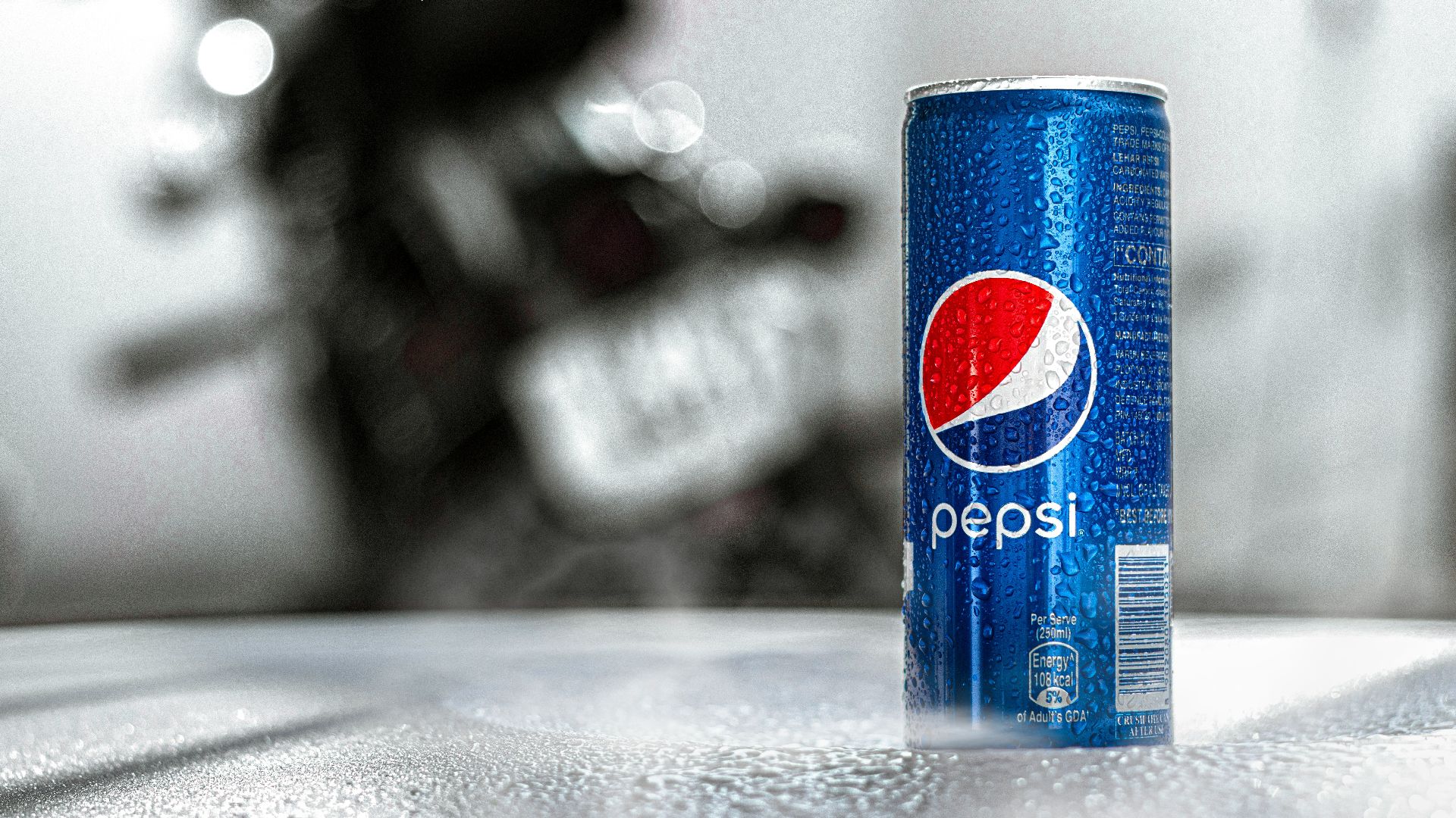 pepsi can on gray table