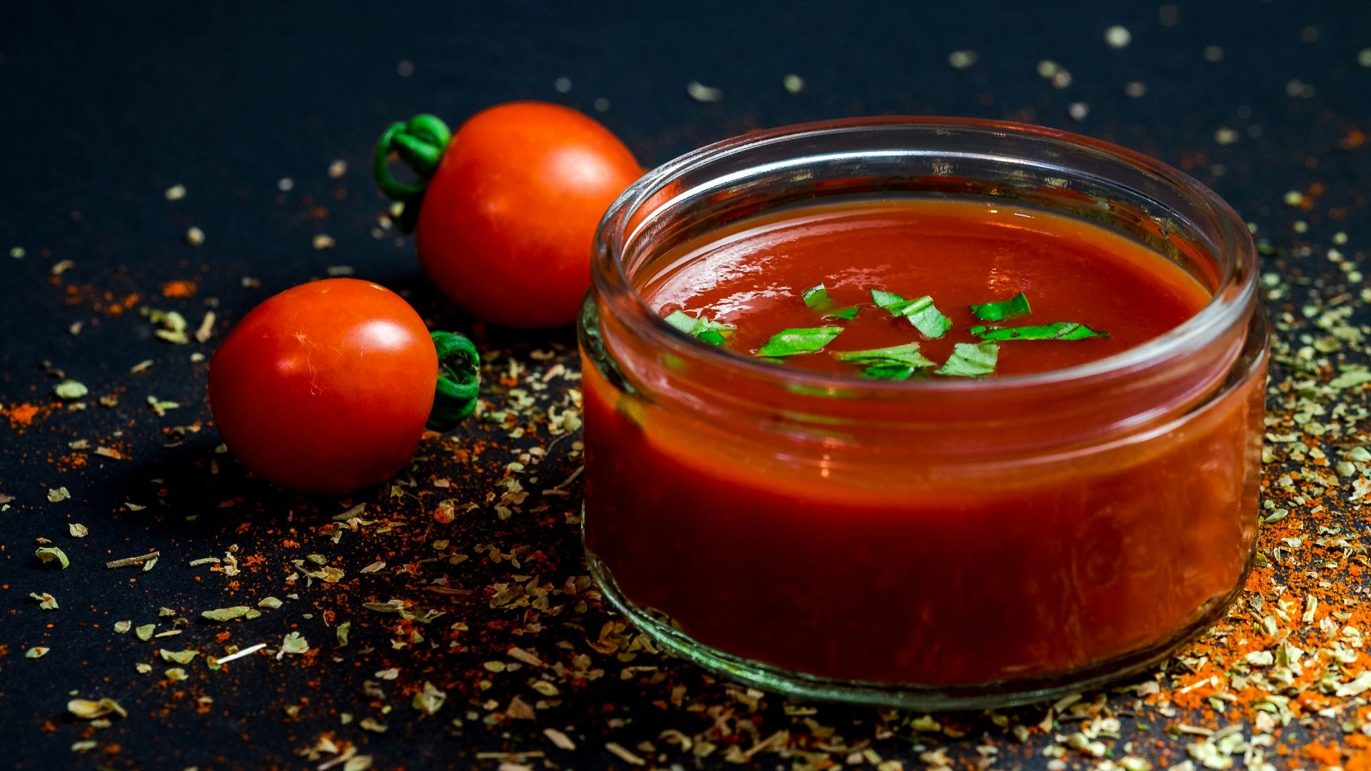 tomato and tomato puree with parsley in bowl