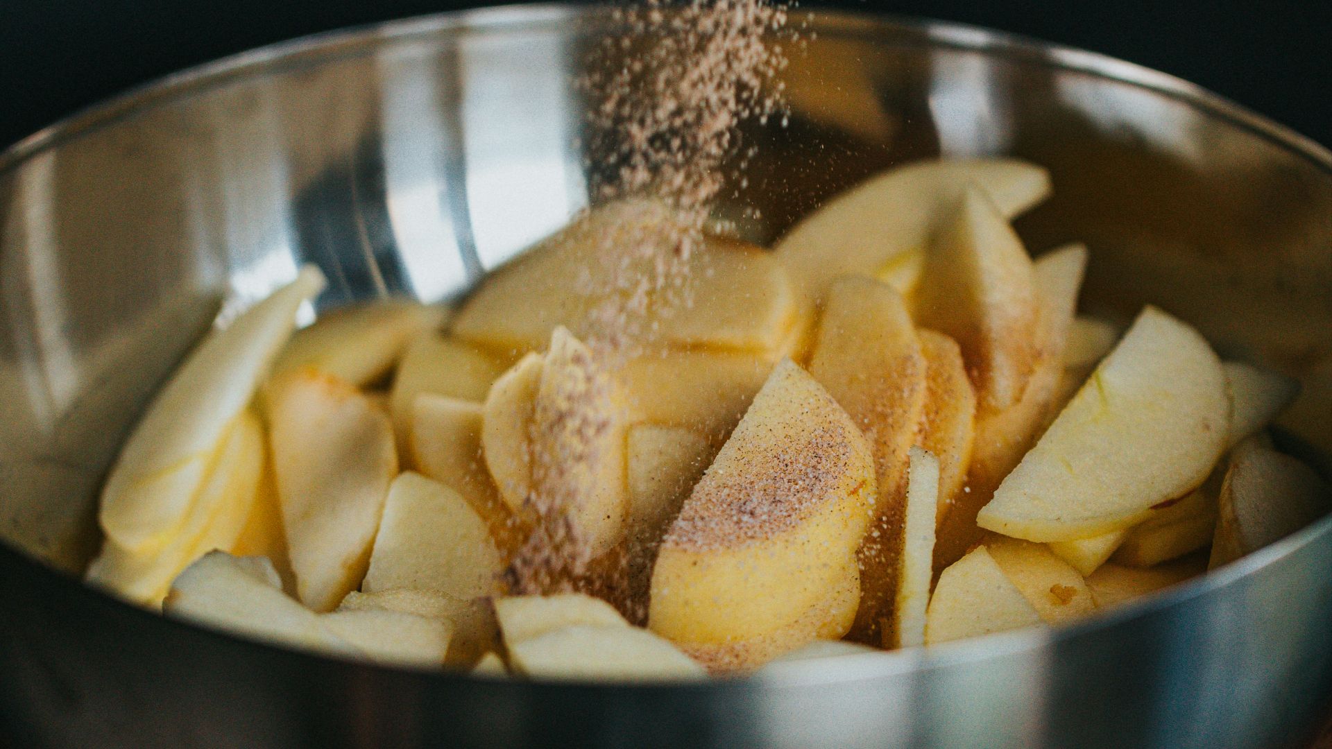sliced banana on stainless steel bowl