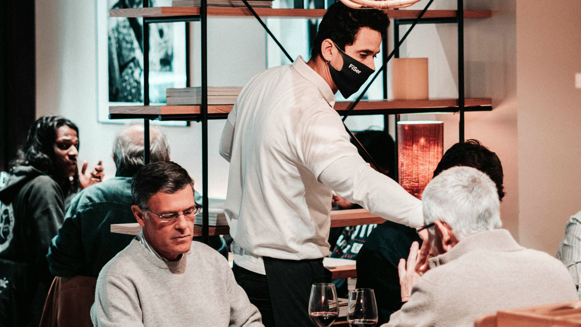 group of people sitting on chair