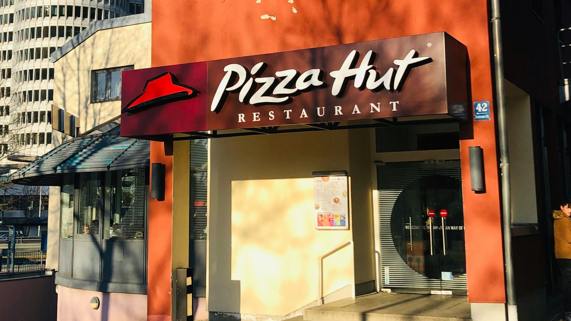brown and white concrete building during daytime