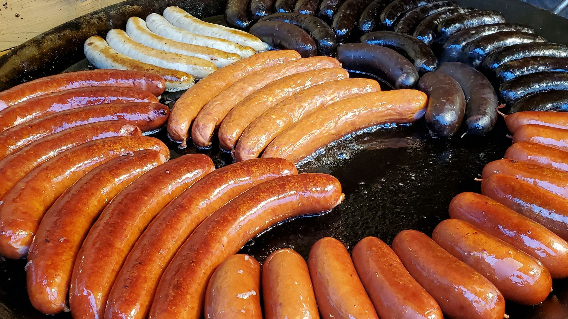 sausage on black round plate