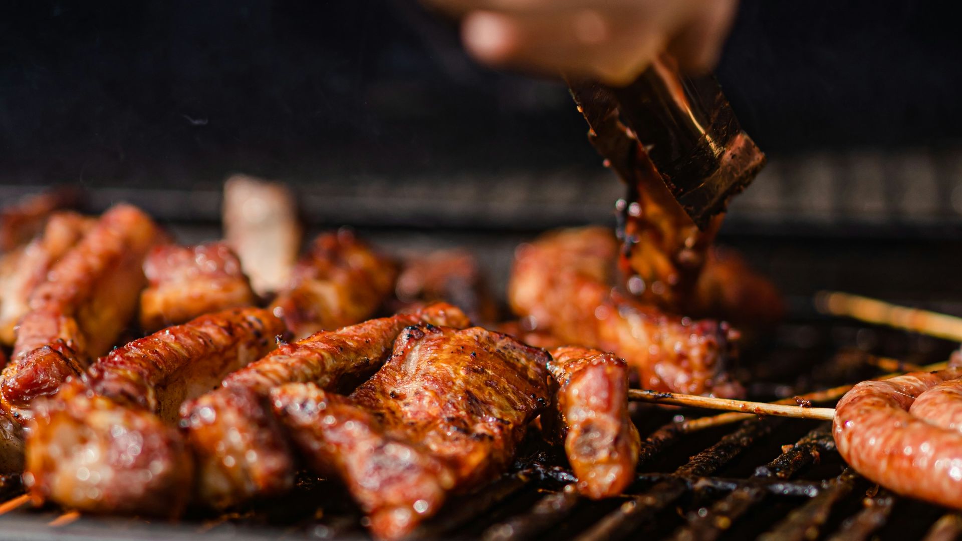 a person is cooking food on a grill