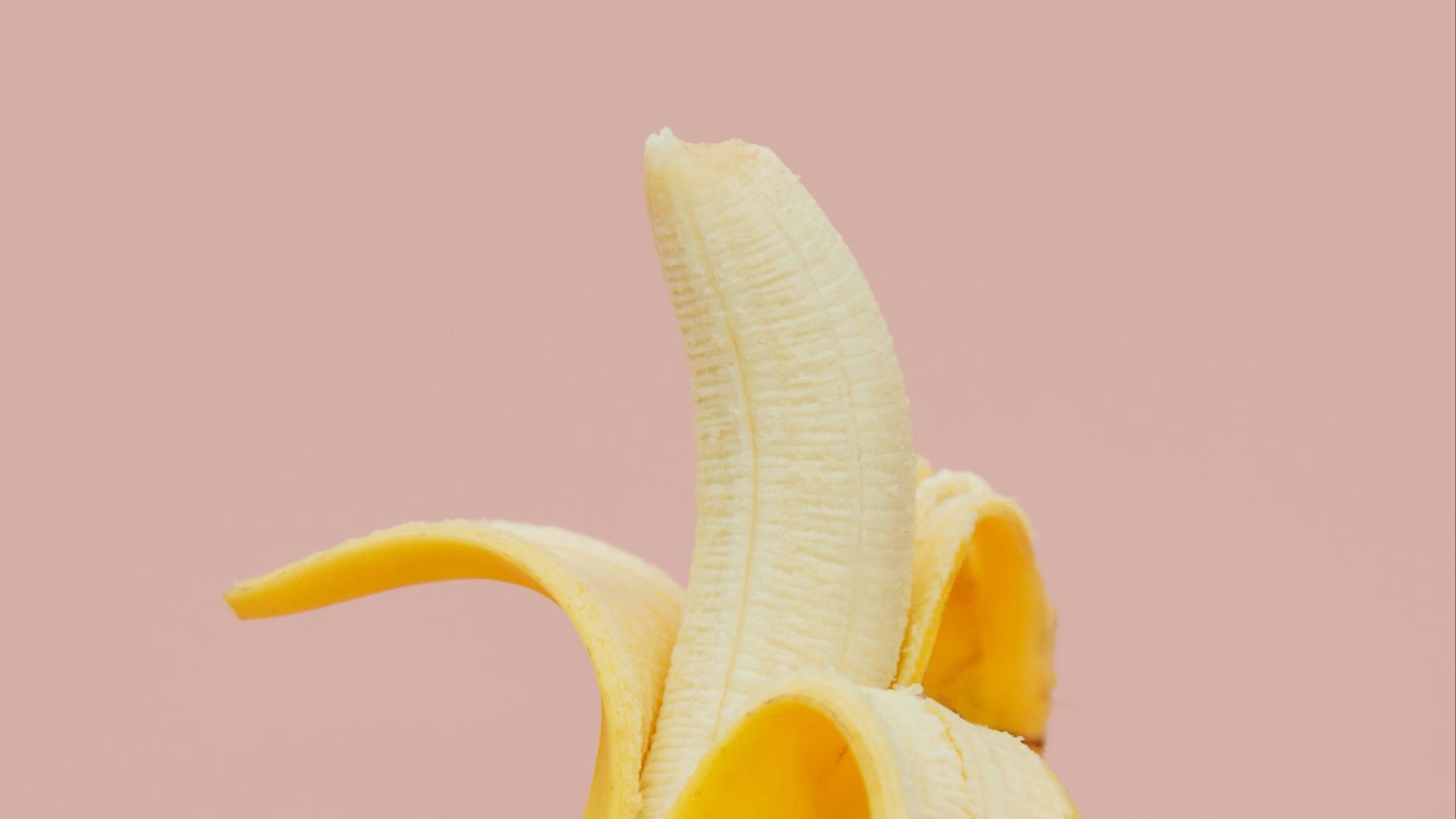 half peeled banana fruit