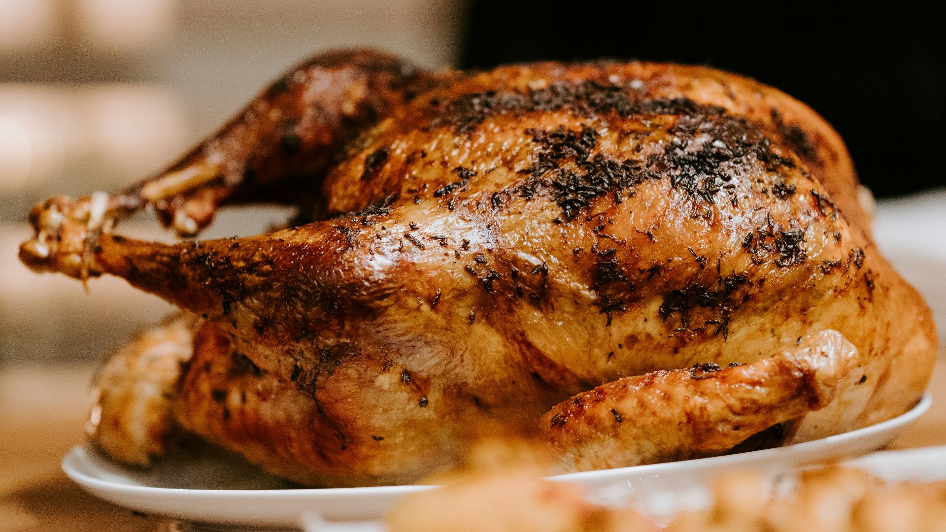 roasted chicken on white ceramic plate