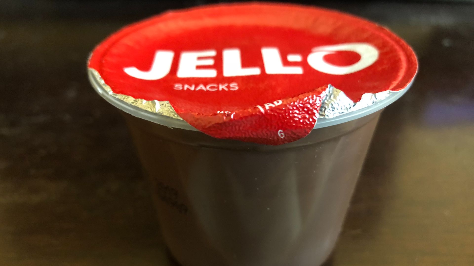 File:2019-01-25 20 08 29 An unopened cup of Jell-O chocolate pudding in the Franklin Farm section of Oak Hill, Fairfax County, Virginia.jpg