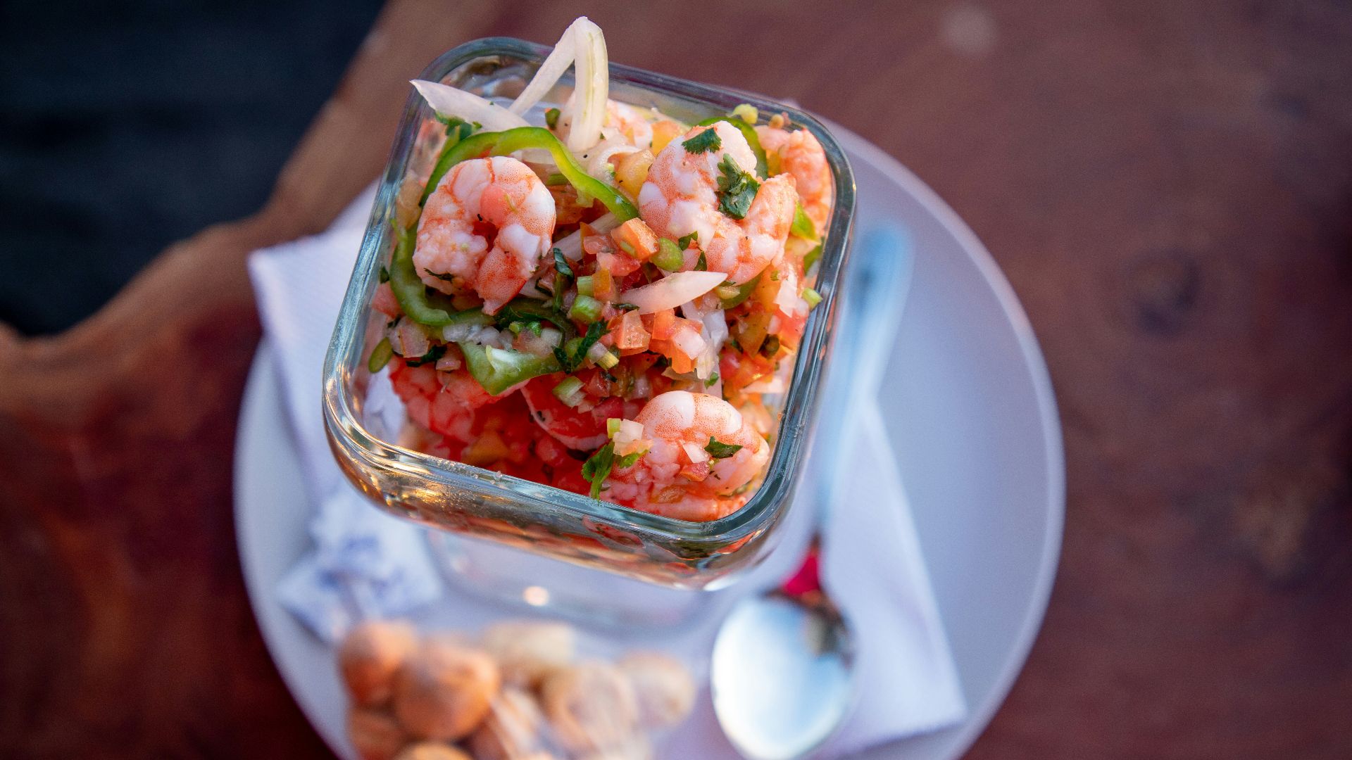 sliced vegetables in clear glass container
