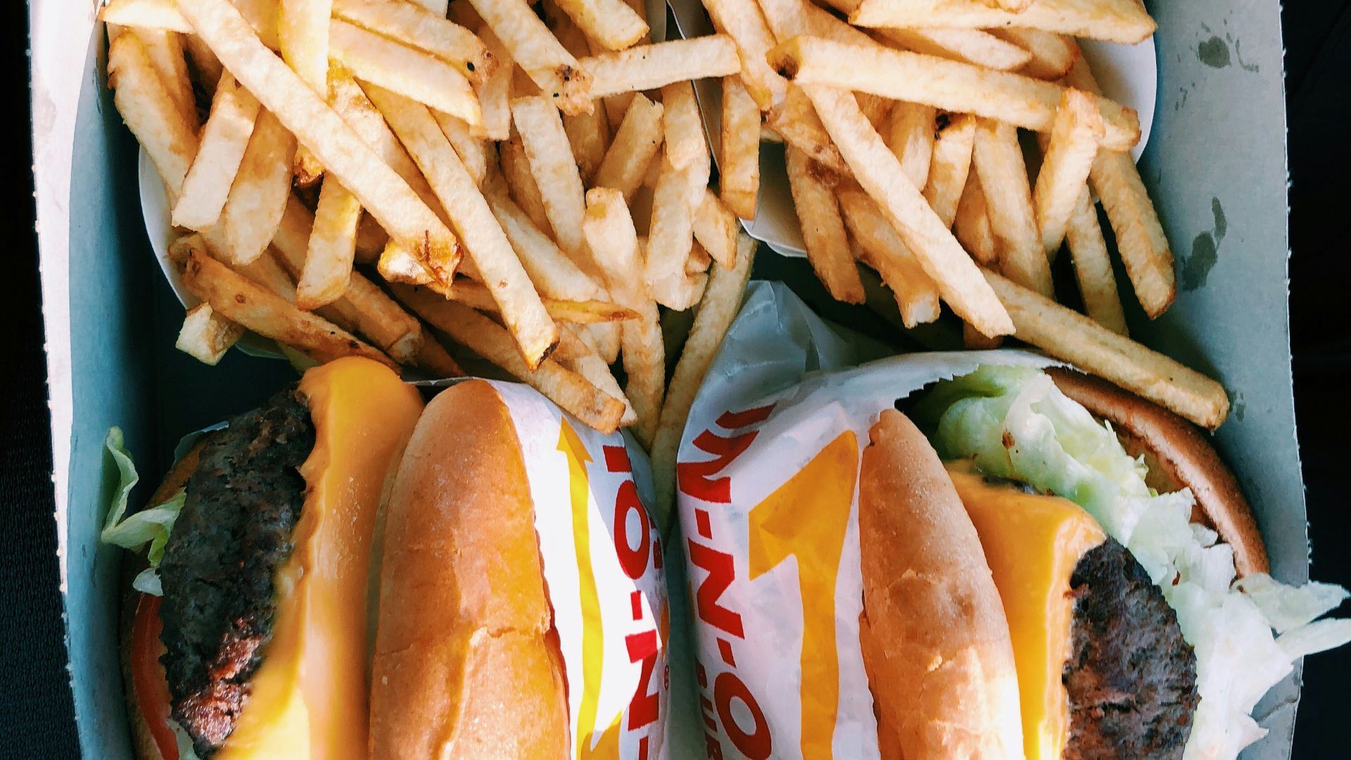 burgers and fries inside box