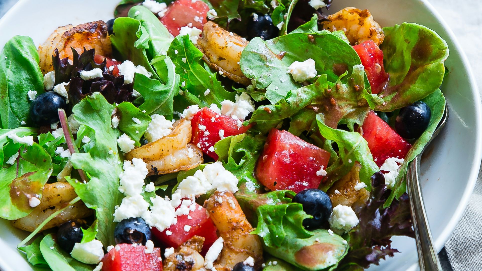 vegetable salad on white ceramic bowl