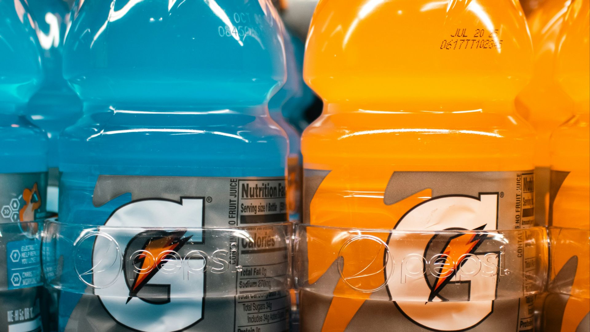 Gatorade bottles are displayed on a store shelf.