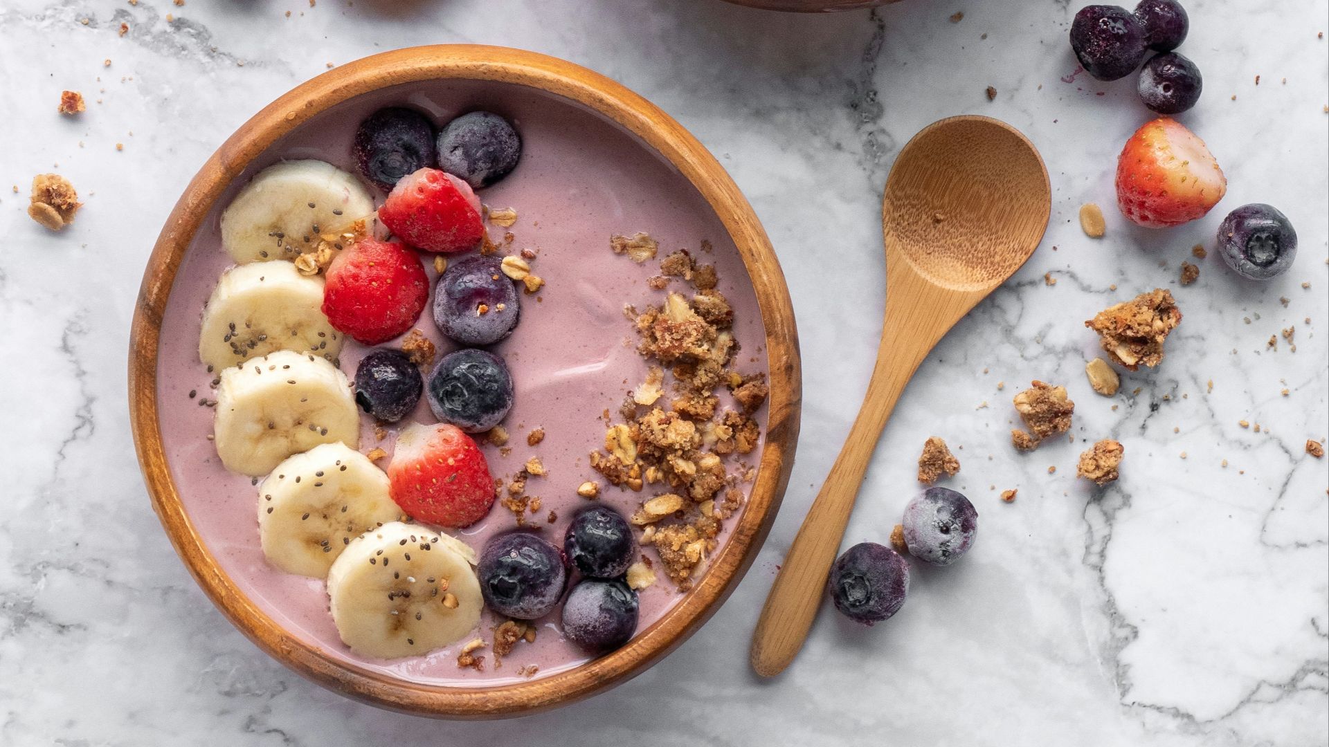 brown wooden spoon on white ceramic bowl