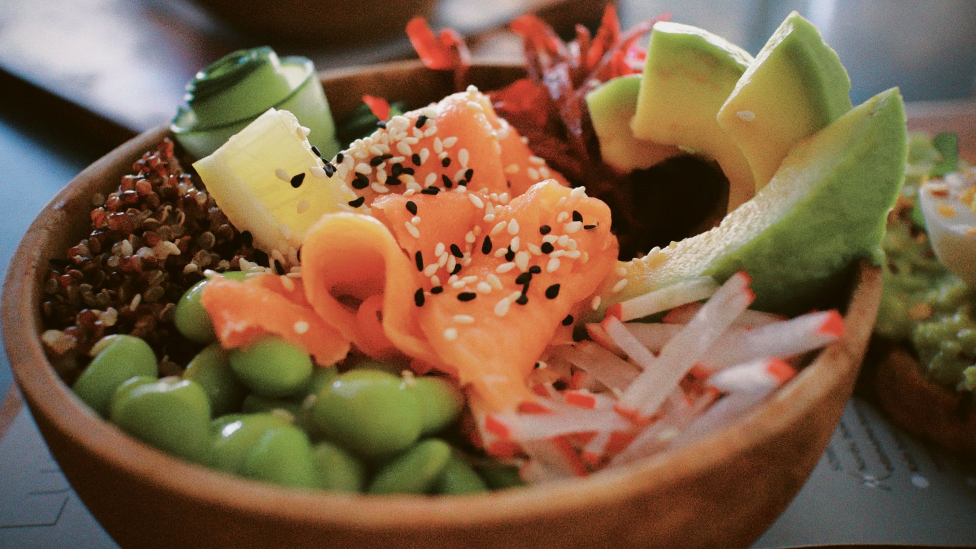 a close up of a bowl of food on a table
