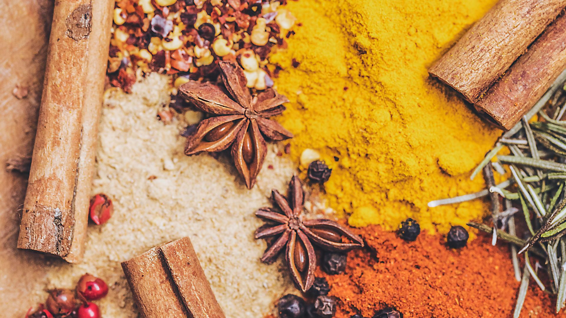 brown wooden chopping board with black beans and brown dried leaves