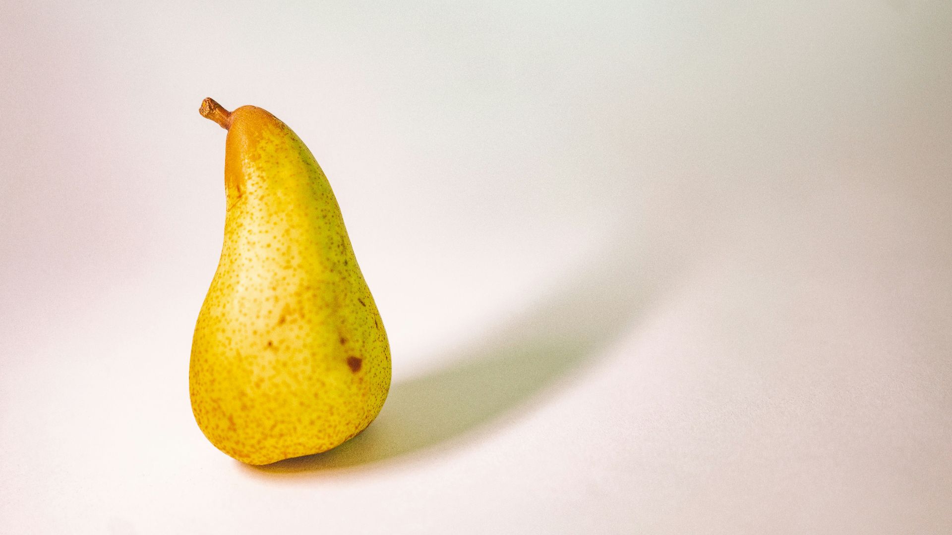 yellow fruit on white surface