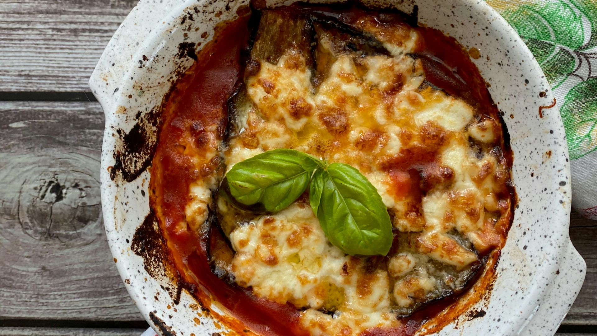 a dish of food on a wooden table
