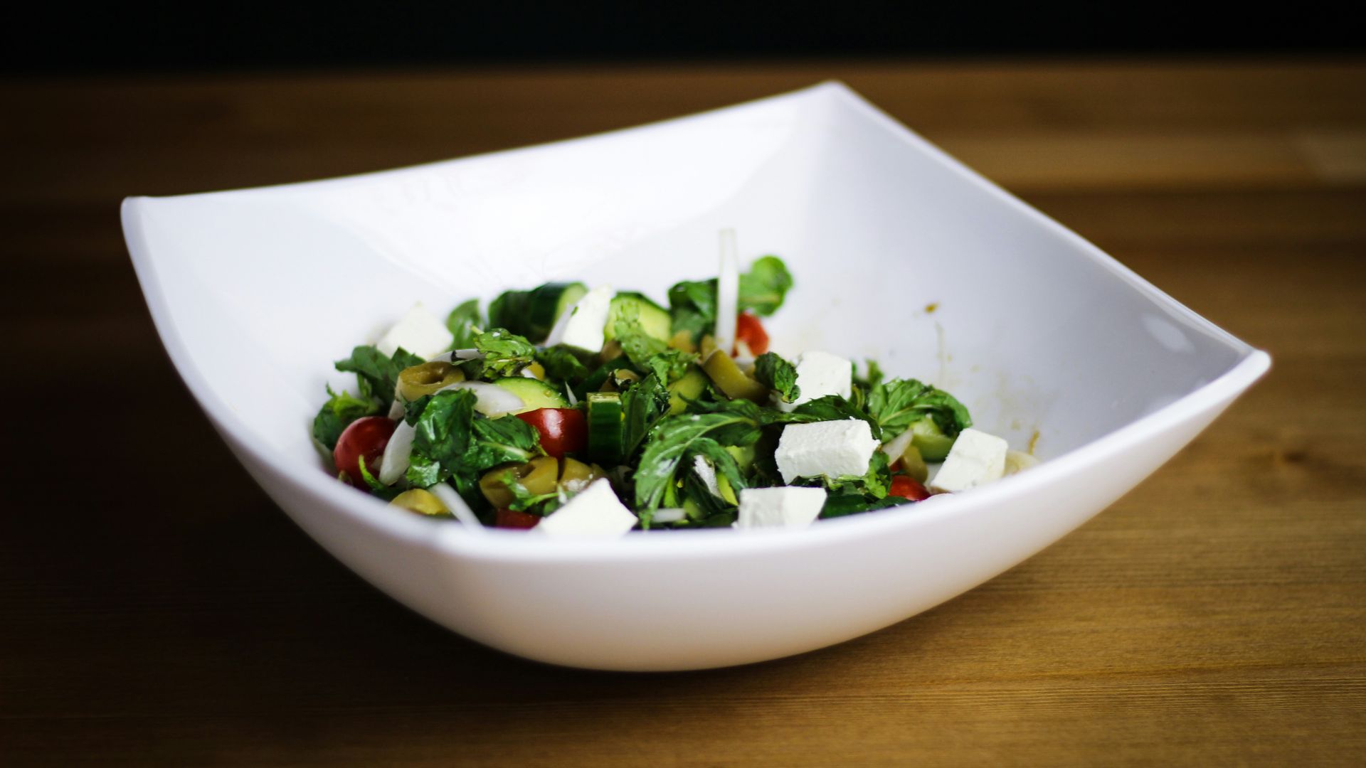 vegetable salad on white ceramic bowl