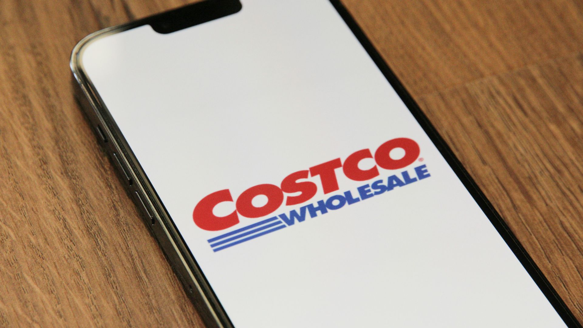 a close up of a cell phone on a table