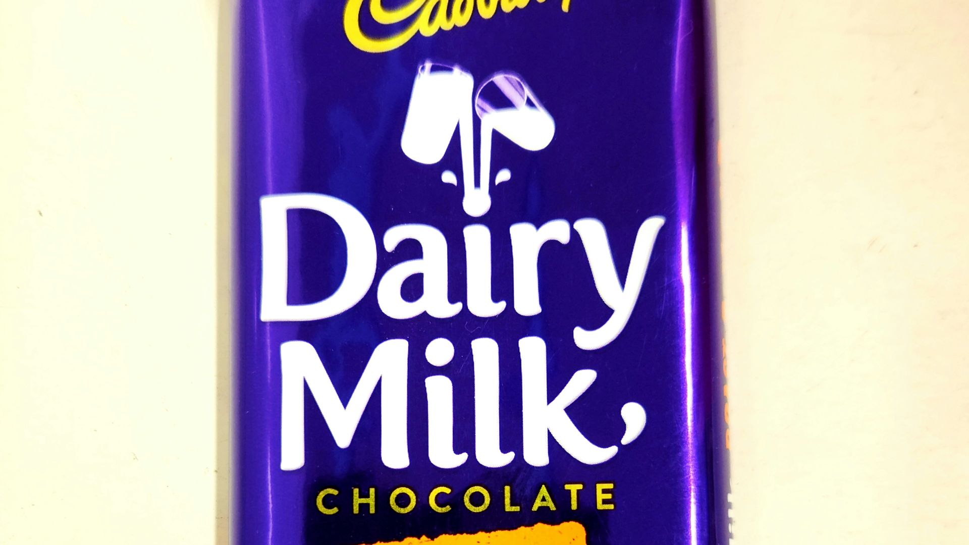A cadbury dairy milk roast almond chocolate bar.