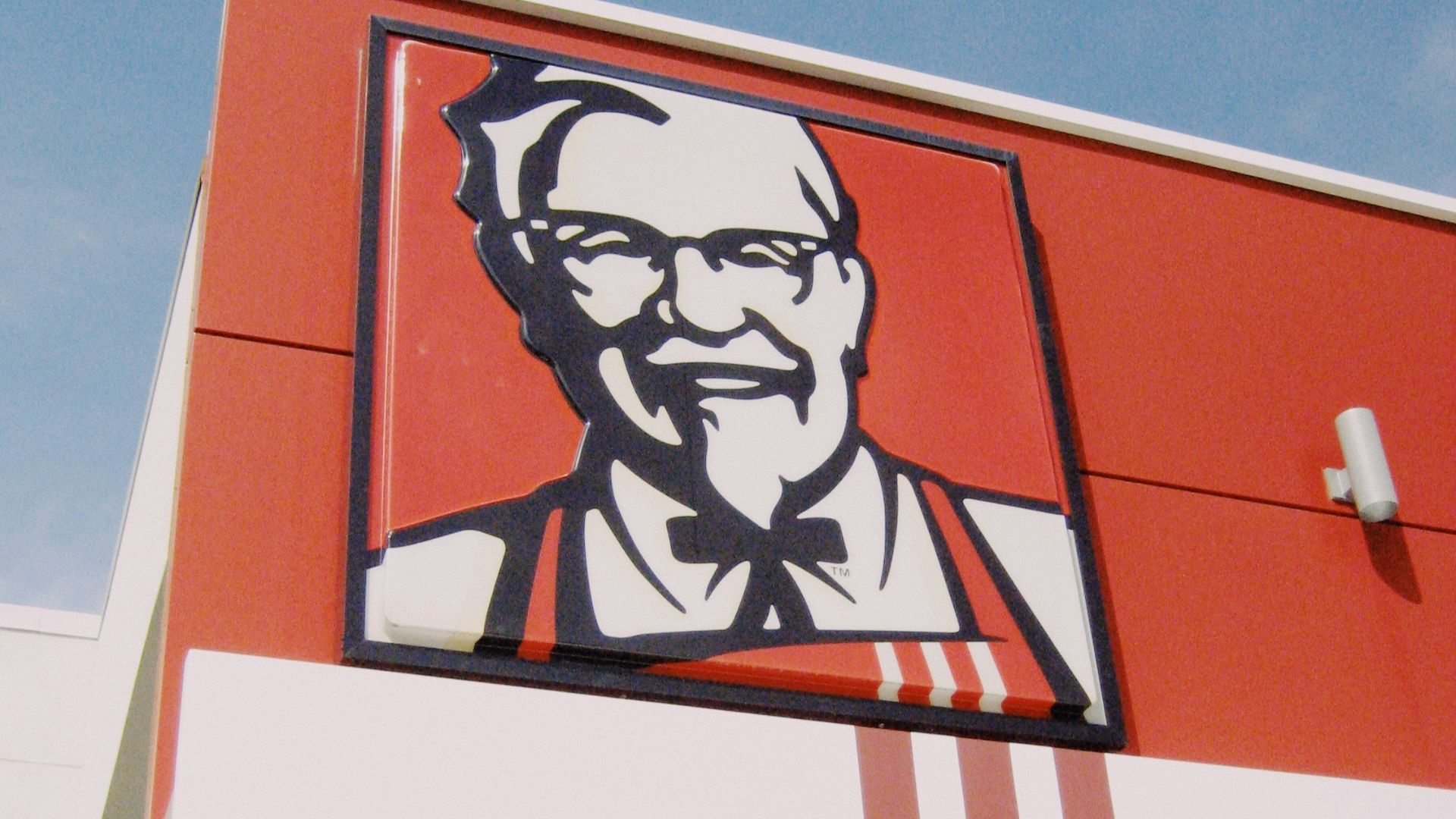 a picture of a man on the side of a building