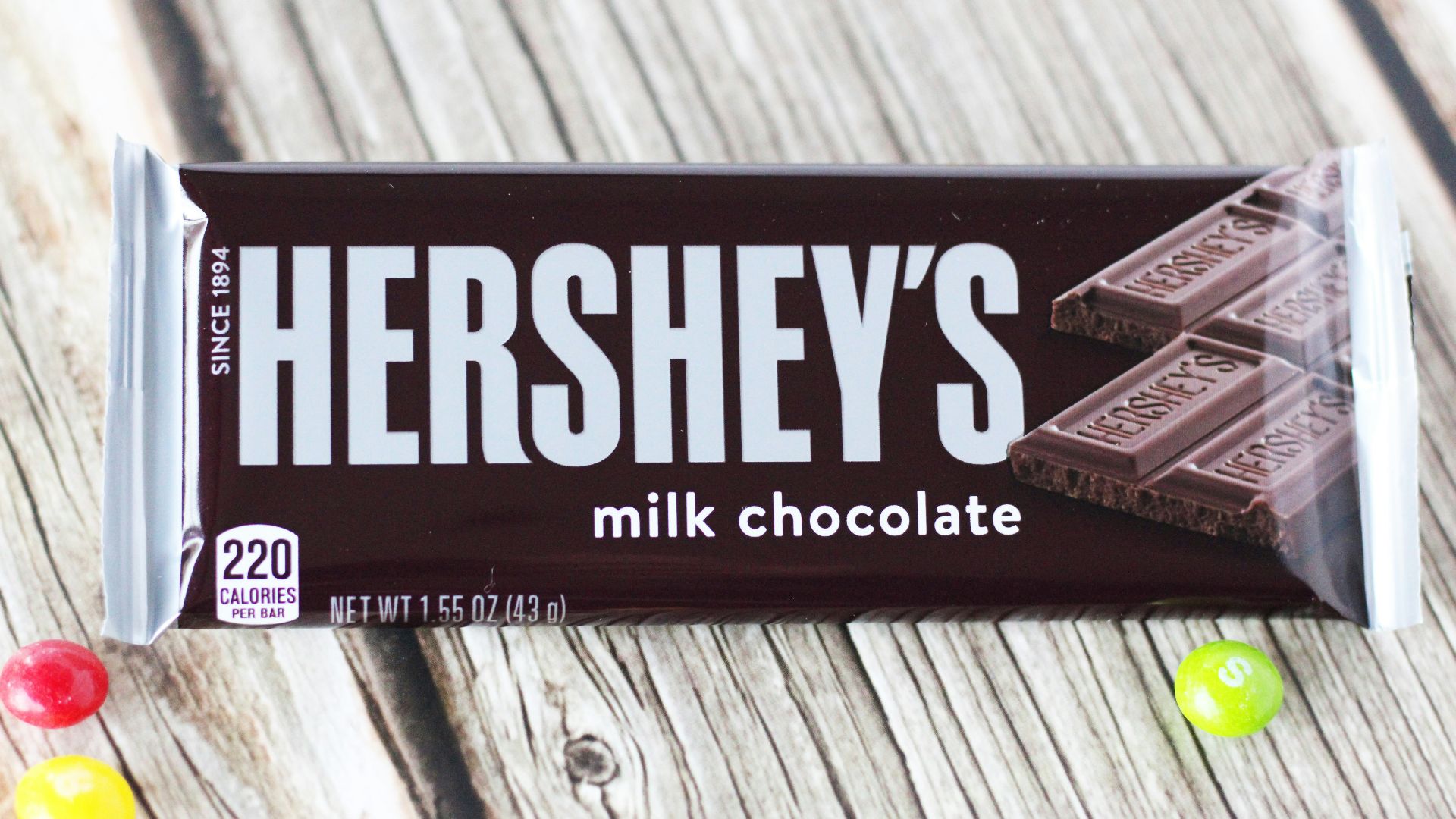 hersheys chocolate bar on gray wooden table