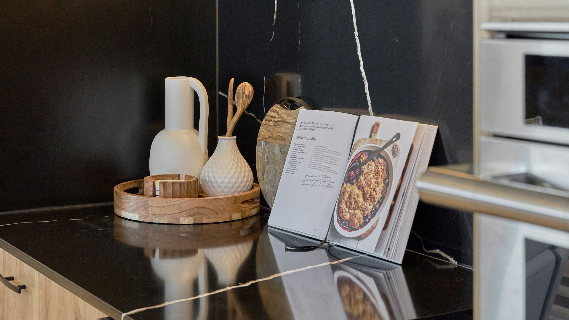 A kitchen with a microwave and a counter top