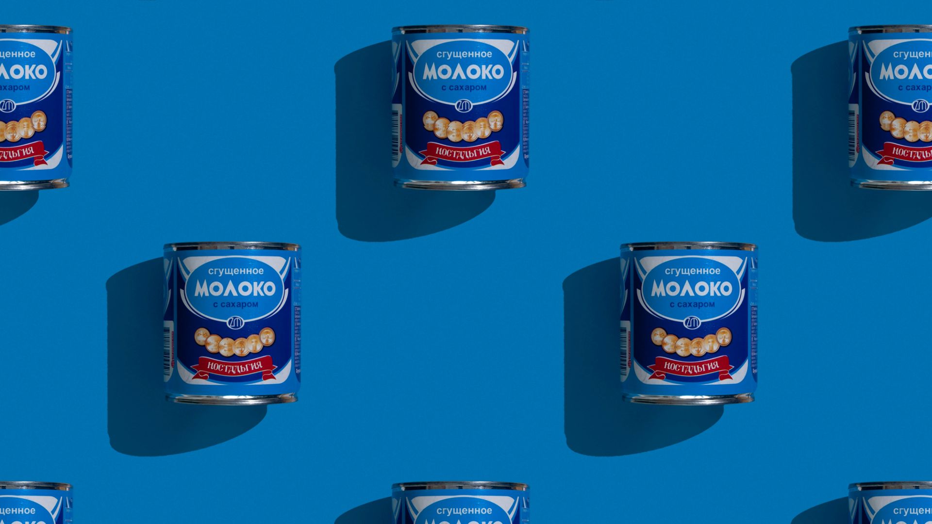 a can of toothpaste on a blue background