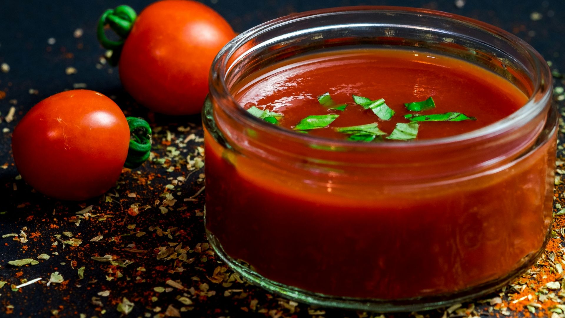 tomato and tomato puree with parsley in bowl