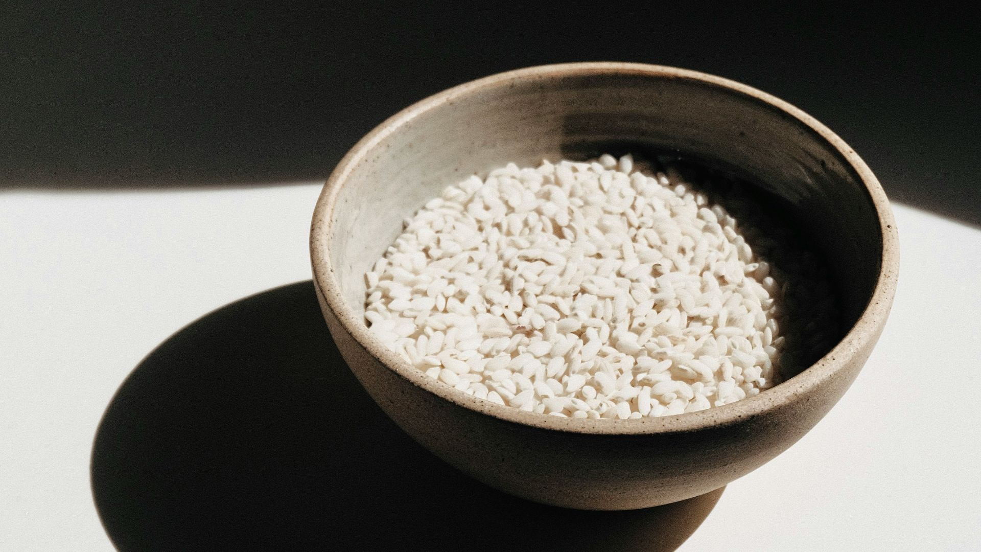 brown ceramic bowl with brown powder