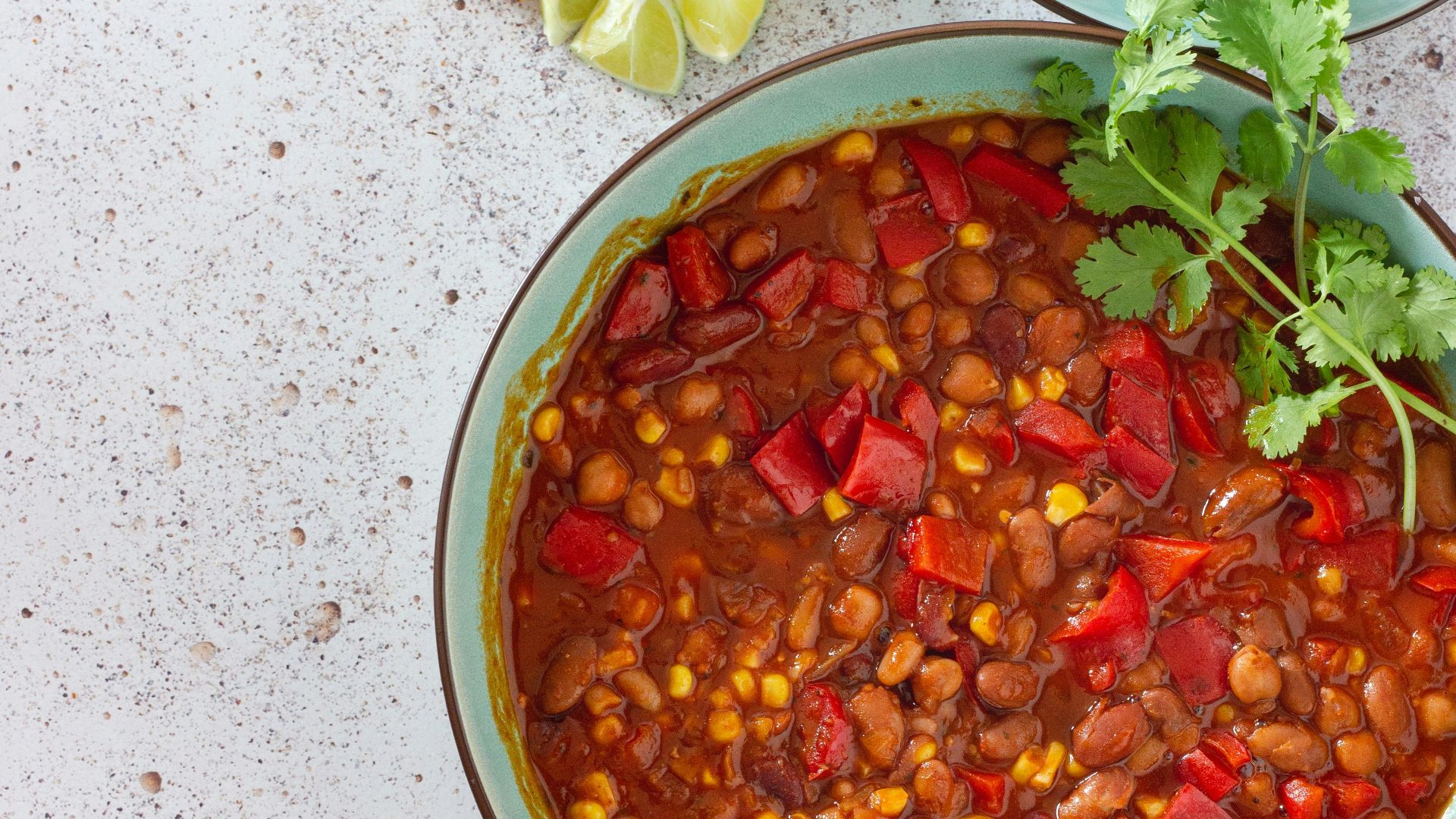 red and green chili peppers in white ceramic bowl