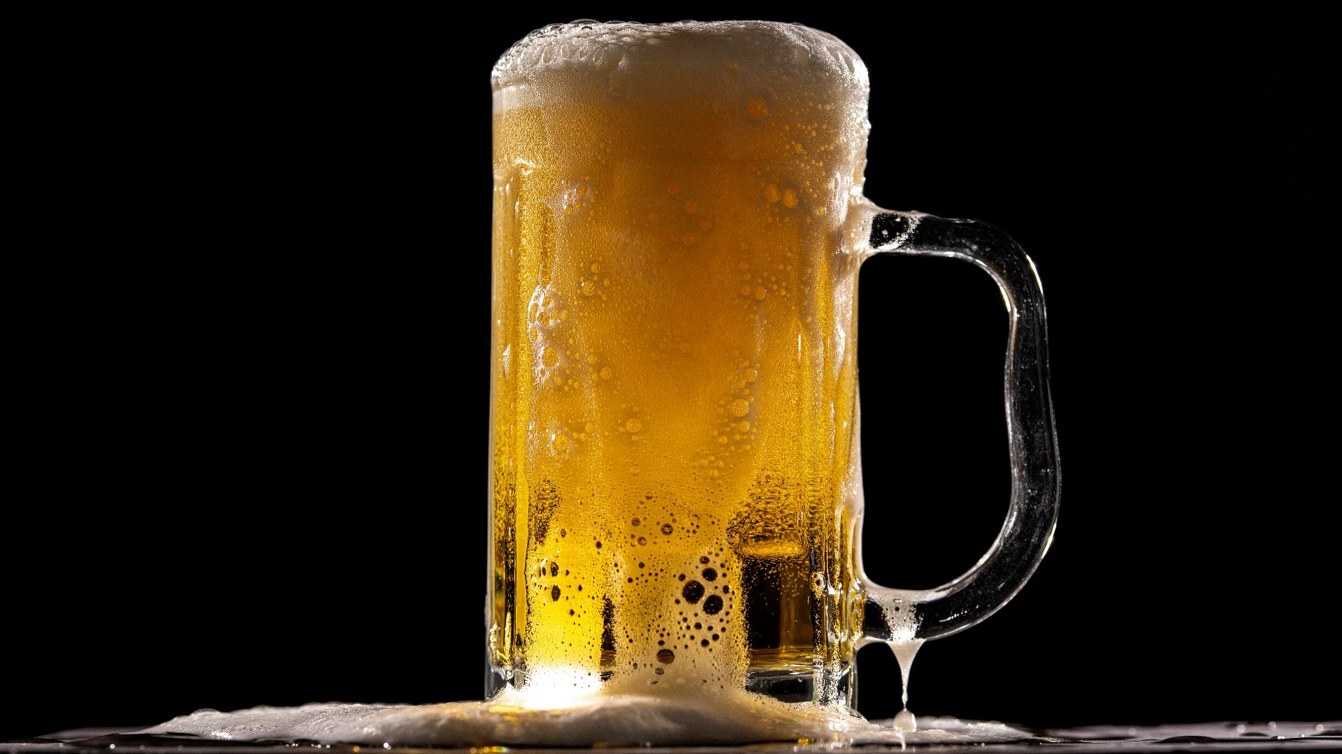 clear glass beer mug with beer