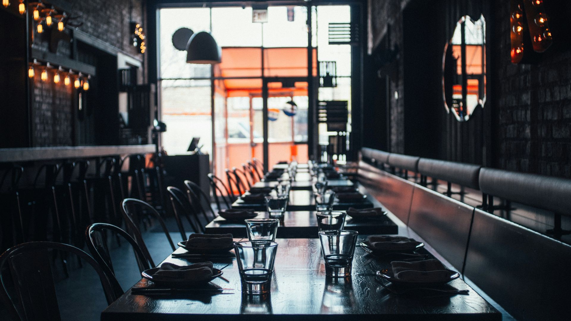 clear glass cup on brown wooden table
